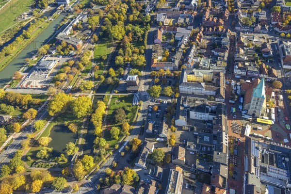 Aerial view, city and evangelical St. Paul's Church and educational center, weekly market market on