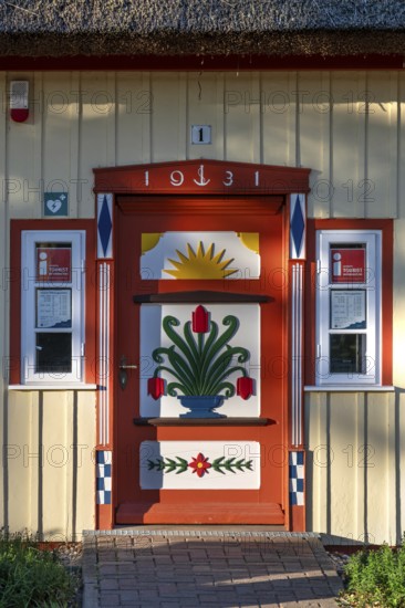 Decorative front door from 1931 on a residential building, Ahrtenshoop, Darß, Mecklenburg-Western