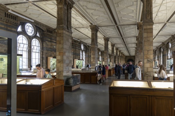 London, United Kingdom - 15 May 2025: Visitors exploring the long, ornate galleries and exhibits