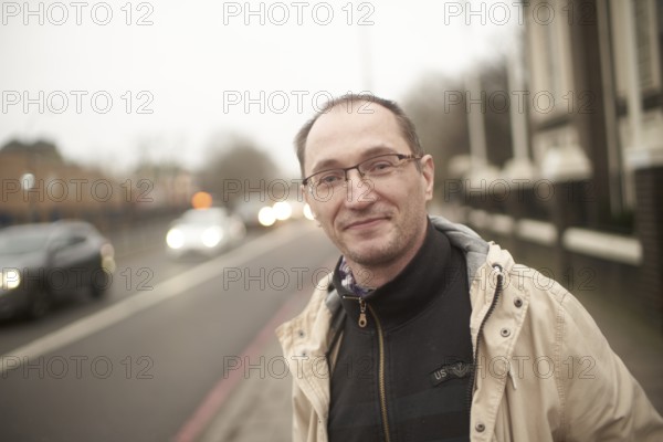 Contentment, daily life, street, portrait, Northern European ethnicity, London, Great Britain,