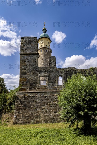 Tower and ruins against a clear blue sky with scattered clouds, The Niedeck Ruins in Arnstadt