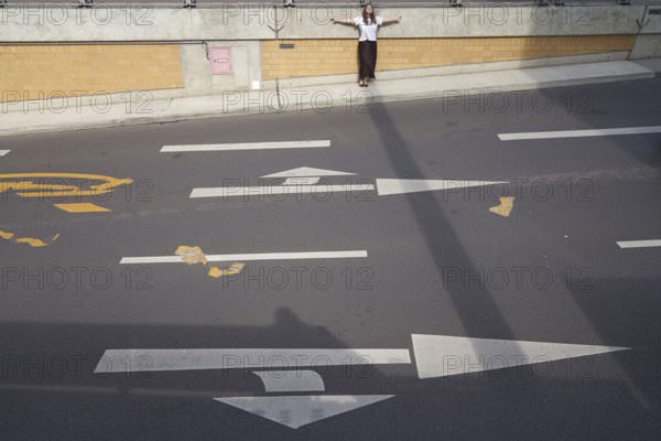 Feeling contrast of light and shadow on the street as metaphor for construction dilemma of warm and