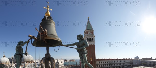 Large-than-life moors at the bell on the Torre dell'Orologio, Clock Tower, St. Mark's Square,