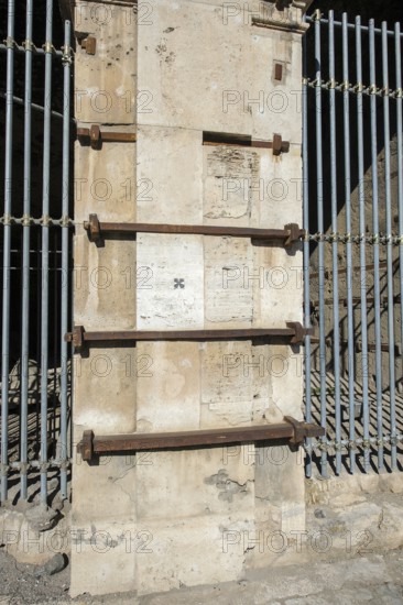Pillar element made of travertine stone from Colosseum with architectural measure used in the