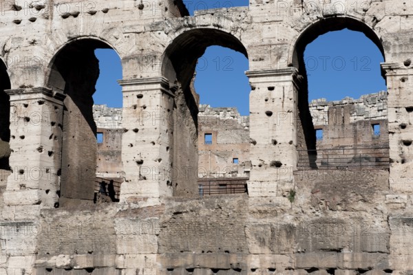 Part of façade with window arch in outer wall of Amphiteatrum Flavium Colosseum Colosseo in ancient