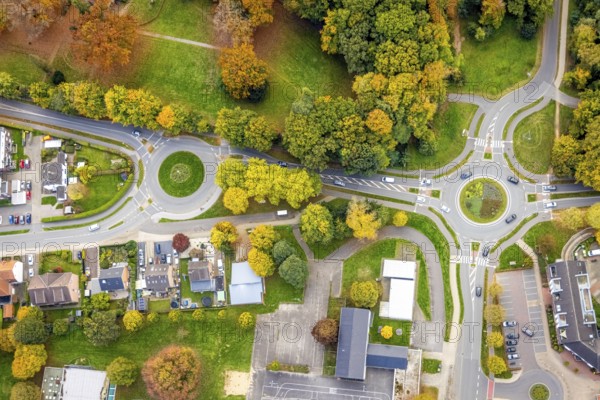 Aerial view, two green roundabouts Udemer Straße, autumn trees, Schneppenbaum, Bedburg-Hau, Lower