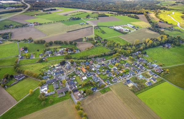 Aerial view, residential area town view district of Hommersum with parish church of St. Peter and