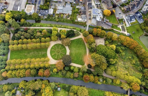 Aerial view, municipal park and autumn trees on the river Niers, tree-lined avenue and circular