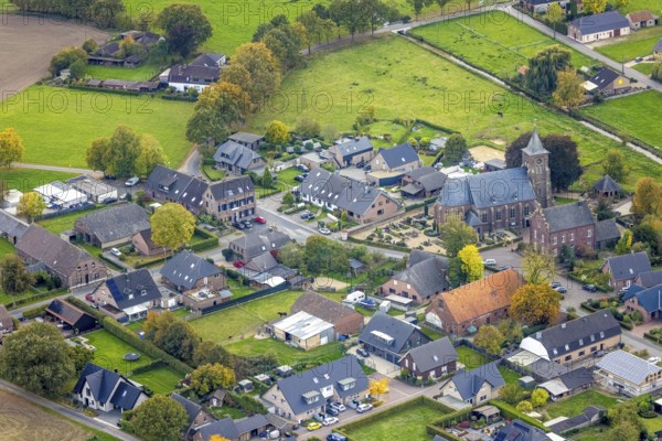 Aerial view, residential area town view district of Hommersum with parish church of St. Peter and