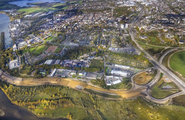 Aerial view, lip mouth area, construction site and new building extension and feeder federal road
