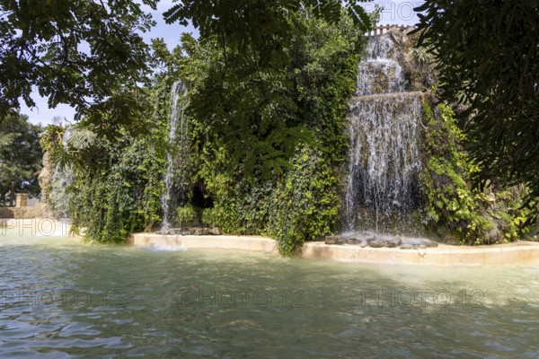 Beautiful natural park with several waterfalls, The Ornamental Pond in Genovés Botanic Gardens