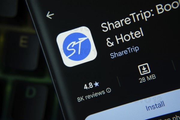 Dhaka, Bangladesh- 27 July 2025: Sharetrip app from Google Playstore is displayed on a smartphone