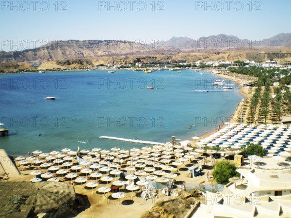 Panorama of the tropical azure and turquoise Red Sea near the central ancient part of the resort