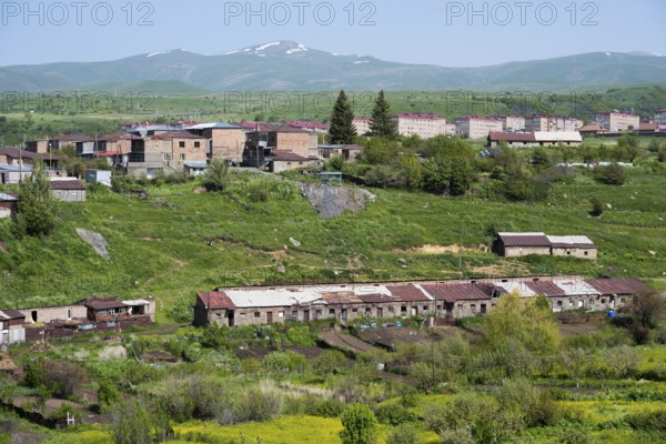 Village with cozy houses surrounded by green hills and mountains, Kechut, Kushchi, Kush-Bilyak,