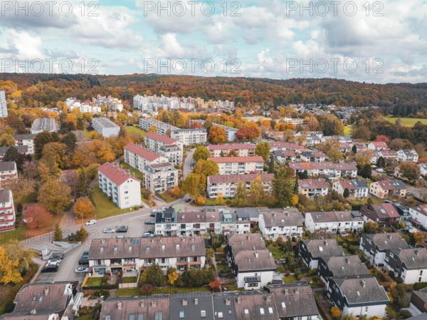 Residential area in autumn colors under bright skies, combining city and nature, Sindelfingen,