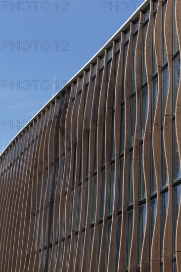 Modern wooden façade with larch pilasters, architecture firm caspar.schmitzmorkramer, Deiker Höfe,