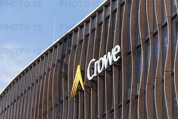 Crowe BPG, audit and consulting firm, logo on modern wooden façade with larch pilasters,