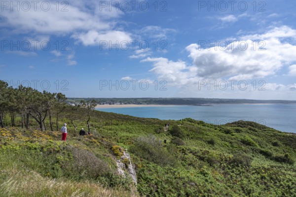An elevated panorama shows the vast landscape of Cap d'Erquy covered with pine, broom and low