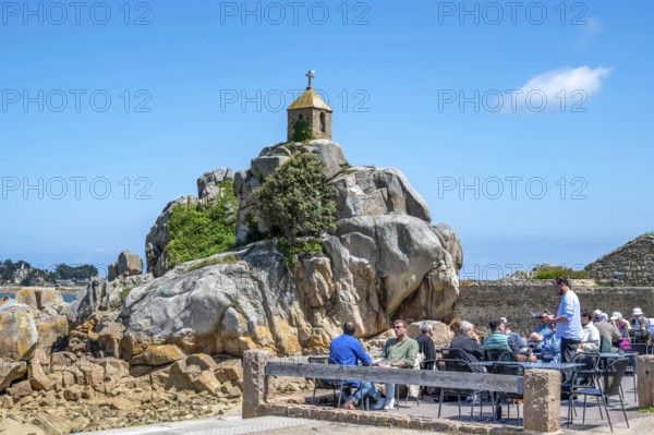 The small stone chapel of Saint-Gildas is perched on a distinctive rock of pink granite, while in