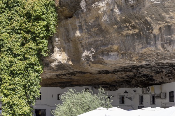 On the road to the white villages. Paths and narrow streets of a historic old town with many white