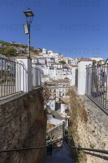 On the road to the white villages. Panorama or skyline of a historic old town with many white