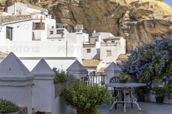 On the road to the white villages. Paths and narrow streets of a historic old town with many white