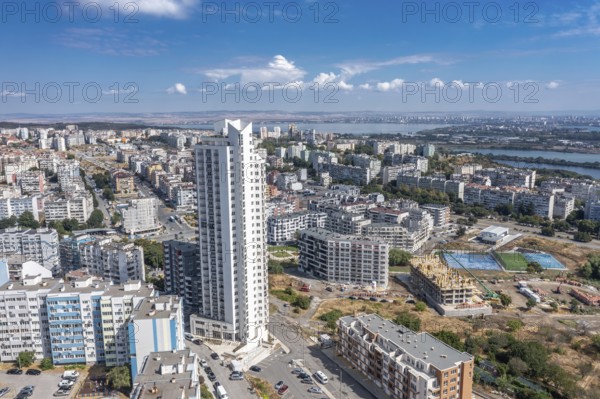 Aerial view of a city with tall buildings and roadways. Aerial view to the skyscraper in the Meden