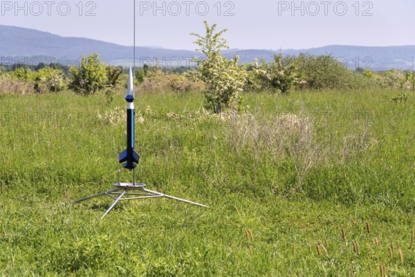 Rocket model prepare for takeoff launch, summer sunny day Prague Czech republic