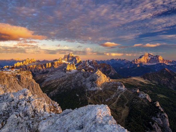Alpenglühen, Rifugio Lagazuoi and rugged Dolomite peaks at sunset, Monte Pelmo in the middle,