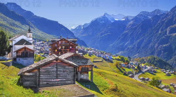 City overview on a mountain terrace above the valley with Ulrichshorn 3925m, Grächen, Mattertal,