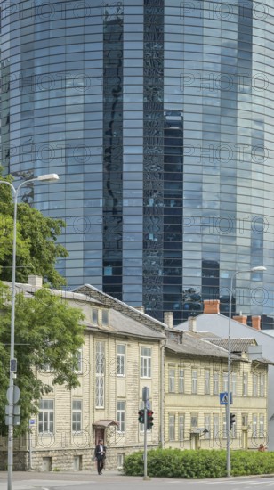Modern office building, high-rise building, small old building, wooden house, Maakri-Kvartal