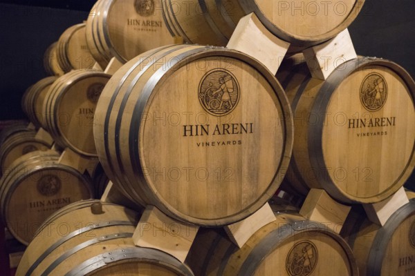 Close-up of Hin Areni brand wooden barrels in a wine cellar, Hin Areni winery, Areni village,