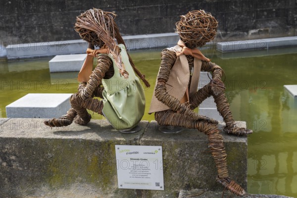 Seated children, willow figures by artist Irmgard Wissing, Deutsche Korbstadt, Lichtenfels, Upper