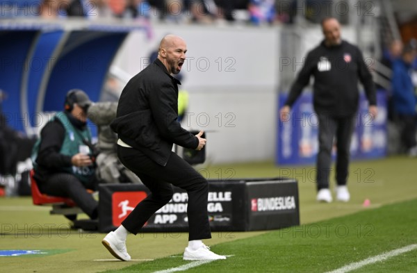 Coach coach Christian Ilzer TSG 1899 Hoffenheim on the sidelines gesture behind coach Frank Schmidt