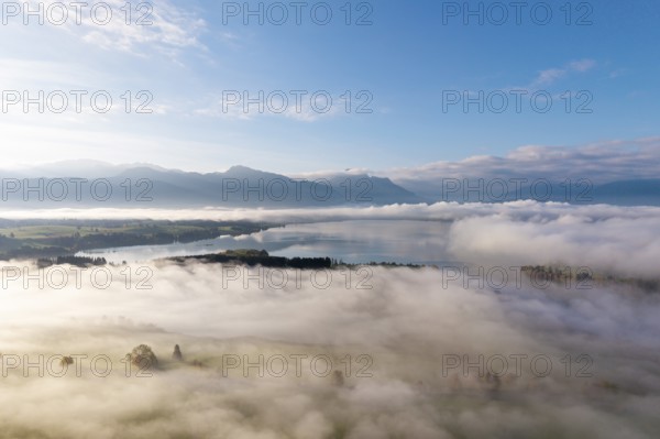Cloudy landscape with Forggensee and mountain panorama at dawn, near Roßhaupten, Ostallgäu, Allgäu,