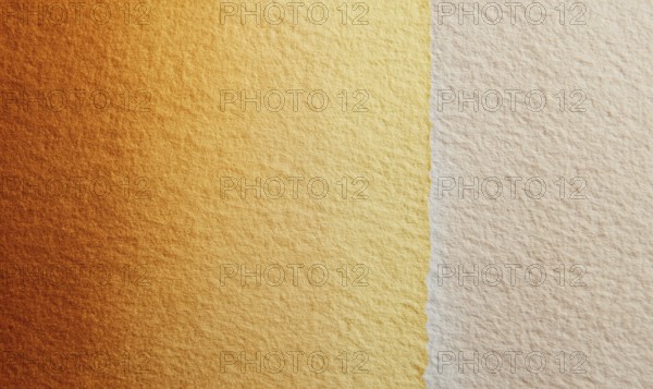 A tan and gold wall with a slightly darker shade of tan. The wall appears to be made of a textured