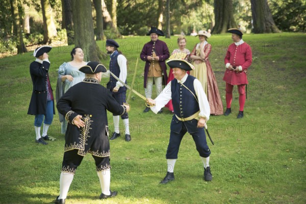 GDANSK, POLAND - August 15, 2017: Two men are fighting by the swords, during historical staging in