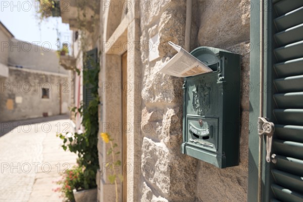 Mailbox. Purple home mailbox. Pink mailbox on Rovinj street, Croatia. Mediterranean style pink