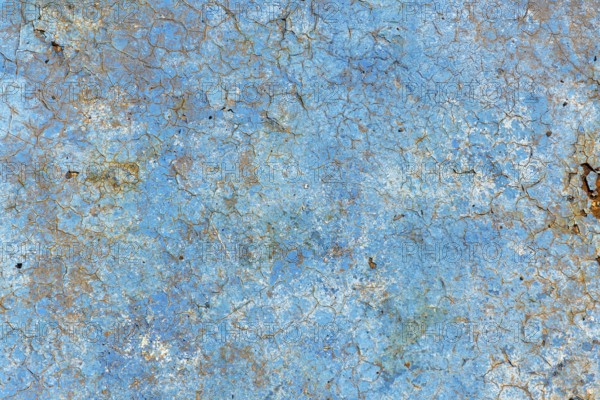 Light blue rusty vintage paint background, color on old pool bottom, brown, yellow, decay texture,