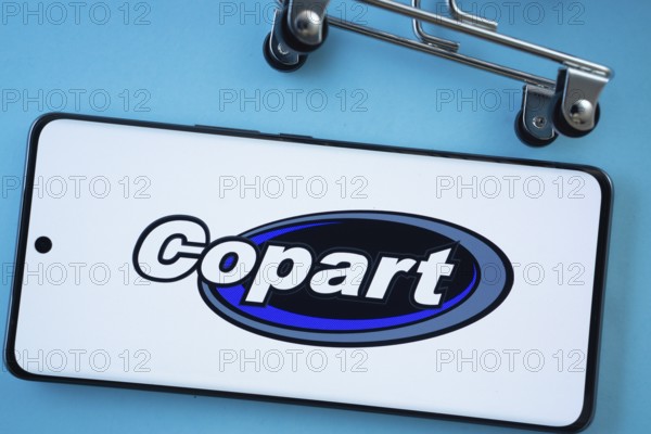 Dhaka, Bangladesh- 03 July 2025: Smartphone screen showing the Copart logo with shopping cart