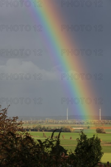Rainbow over the Calenberger Land between Hanover and Hildesheim, wind turbines seen from the