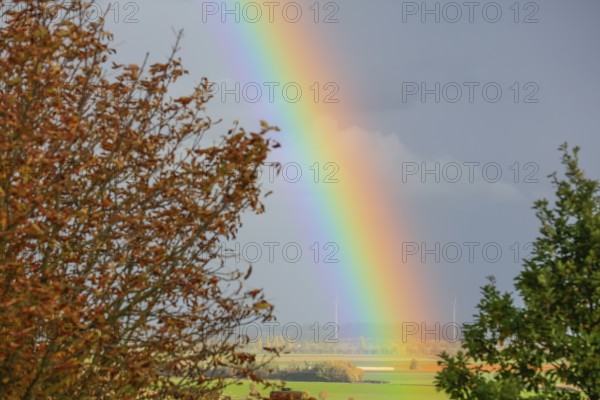Rainbow over the Calenberger Land between Hanover and Hildesheim, wind turbines seen from the