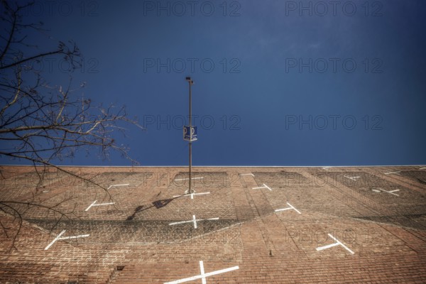 From a frog's eye view, the steep brick parking lot in Cologne's residential park looks almost like