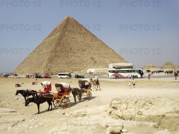 The Great Pyramid of Giza, nestled in the sands of the Sahara Desert, features a pharaonic