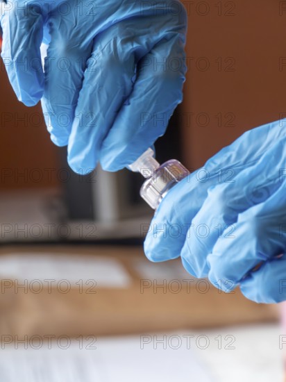 Istambul, Turkey October 21st 2025 Nurse hands in blue gloves preparing Sandostatin Anti growth