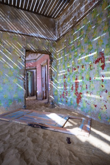 Building taken over by desert sand, in a former diamond town, today a ghost town, Lost Place,