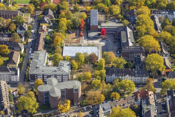 Aerial view, Maria-Wächtler-Gymnasium, below catholic church of St. Andreas, autumn trees,