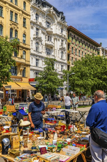 Antique and flea market, on the Chain Bridge south of the Naschmarkt, behind the historic facades