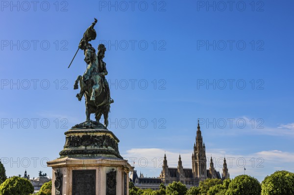 Monument of Archduke Karl, behind it the Town Hall with its neo-Gothic façade, Heldenplatz, Vienna,