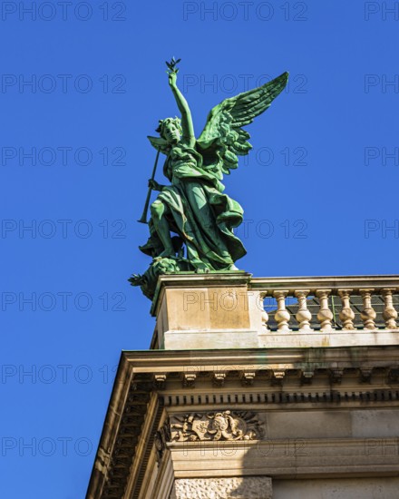 A bronze angel on the roof of the Kunsthistorisches Museum on Maria-Theresien-Platz, Vienna,